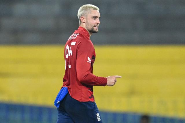 England's Will Jacks celebrates after taking the wicket of New Zealand's Glenn Phillips during the 2026 ICC Men's T20 Cricket World Cup Super Eights match between England and New Zealand at the R Premadasa Stadium in Colombo on February 27, 2026. (Photo by R. Satish BABU / AFP)