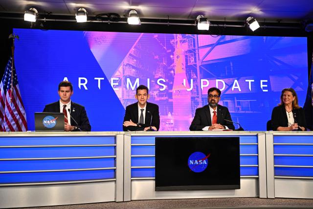 NASA Administrator Jared Isaacman (2L), NASA Associate Administrator Amit Kshatriya (2R), and Lori Glaze (R), associate administrator for NASA’s Exploration Systems Development Mission Directorate, speak during a press conference to provide an update on the Artemis II mission at the Kennedy Space Center in Cape Canaveral, Florida, on February 27, 2026. NASA announced an overhaul of the Artemis lunar program amid technical delays. (Photo by Miguel J Rodriguez Carrillo / AFP)