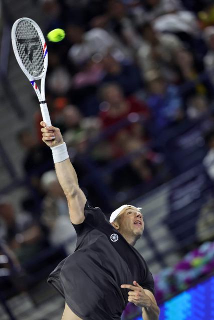 Netherlands' Tallon Griekspoor serves during his men’s singles semi-final match against Russia’s Andrey Rublev at the Dubai Duty Free Tennis tournament in Dubai on February 27, 2026. (Photo by Fadel SENNA / AFP)