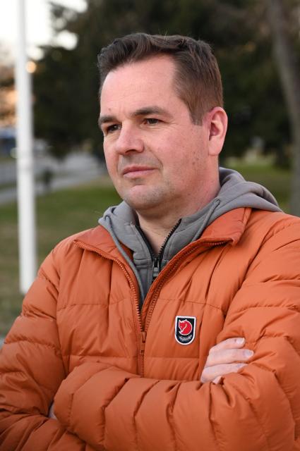 Hungary's ruling Fidesz party spokesperson Balazs Nemeth campaigns in one of Budapest's outer districts on February 27, 2026. (Photo by Attila KISBENEDEK / AFP)