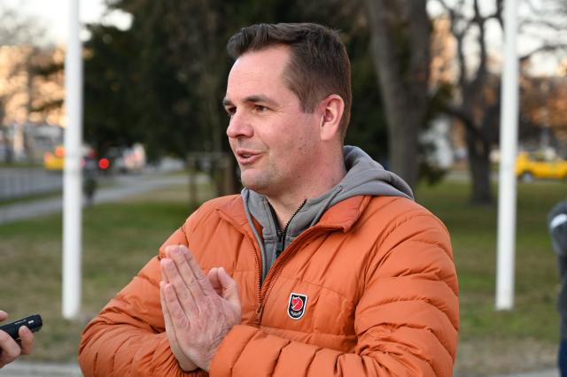 Hungary's ruling Fidesz party spokesperson Balazs Nemeth campaigns in one of Budapest's outer districts on February 27, 2026. (Photo by Attila KISBENEDEK / AFP)