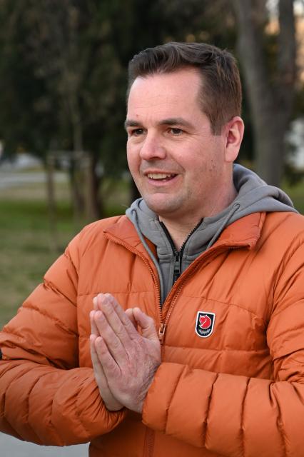 Hungary's ruling Fidesz party spokesperson Balazs Nemeth campaigns in one of Budapest's outer districts on February 27, 2026. (Photo by Attila KISBENEDEK / AFP)