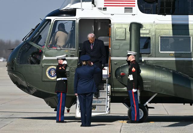 US President Donald Trump steps off Marine One before boarding Air Force One at Joint Base Andrews in Maryland as he departs for Texas on February 27, 2026. President Trump is traveling to Corpus Christi, Texas, to deliver remarks on energy. (Photo by Mandel NGAN / AFP)