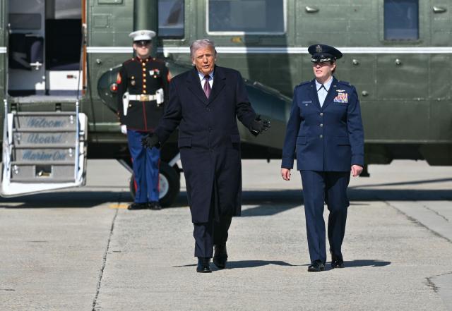 US President Donald Trump walks to board Air Force One at Joint Base Andrews in Maryland as he departs for Texas on February 27, 2026. President Trump is traveling to Corpus Christi, Texas, to deliver remarks on energy. (Photo by Mandel NGAN / AFP)
