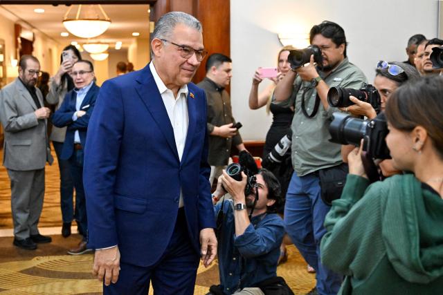 Venezuela's former presidential candidate and recently released political prisoner Enrique Marquez arrives for a press conference in Caracas on February 27, 2026. Venezuelan former presidential candidate Enrique Marquez, recently released from prison, appeared on February 24 in the gallery for honored guests at the US Congress, invited by President Donald Trump as he delivered his State of the Union address. Marquez was among the opposition figures who did not recognize Nicolas Maduros electoral victory in July 2024, a result also rejected by Washington and the European Union. He was detained in January 2025 and remained in prison until early January of this year. (Photo by Juan BARRETO / AFP)