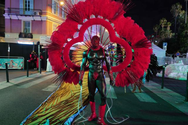 An artist poses during the "Lou Queernaval", the first gay carnival in France as part of the Nice carnival, southeastern France, on February 27, 2026. The edition 2026 of the Nice Carnival, whose theme is "Long live the Queen", takes place until March 1, 2026. (Photo by Valery HACHE / AFP)