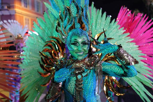An artist poses during the "Lou Queernaval", the first gay carnival in France as part of the Nice carnival, southeastern France, on February 27, 2026. The edition 2026 of the Nice Carnival, whose theme is "Long live the Queen", takes place until March 1, 2026. (Photo by Valery HACHE / AFP)