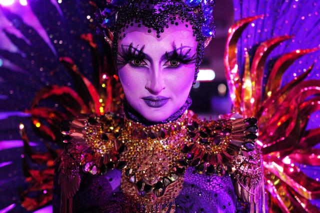 An artist poses during the "Lou Queernaval", the first gay carnival in France as part of the Nice carnival, southeastern France, on February 27, 2026. The edition 2026 of the Nice Carnival, whose theme is "Long live the Queen", takes place until March 1, 2026. (Photo by Valery HACHE / AFP)