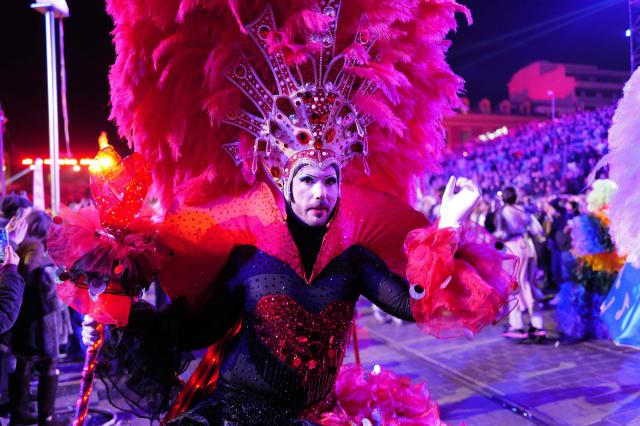 An artist performs during the "Lou Queernaval", the first gay carnival in France as part of the Nice carnival, southeastern France, on February 27, 2026. The edition 2026 of the Nice Carnival, whose theme is "Long live the Queen", takes place until March 1, 2026. (Photo by Valery HACHE / AFP)