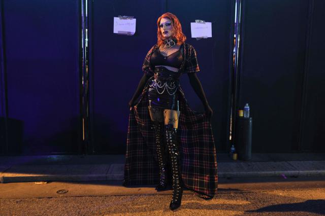 A drag-queen poses during the "Lou Queernaval", the first gay carnival in France as part of the Nice carnival, southeastern France, on February 27, 2026. The edition 2026 of the Nice Carnival, whose theme is "Long live the Queen", takes place until March 1, 2026. (Photo by Valery HACHE / AFP)