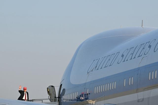 US President Donald Trump boards Air Force One before departing Corpus Christi International Airport in Corpus Christi, Texas on February 27, 2026. Trump is heading to Palm Beach, Florida to spend the weekend at his Mar-a-Lago resort. (Photo by Mandel NGAN / AFP)