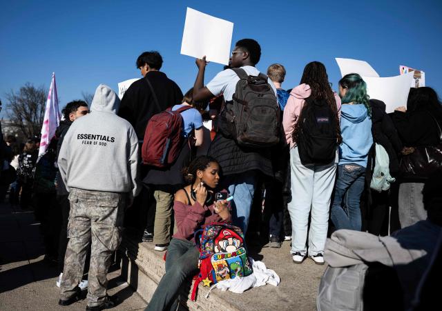 Washington DC high school students rally at an "End ICE brutality" protest by the Lincoln Memorial in Washington, DC, on February 27, 2026. (Photo by ANDREW CABALLERO-REYNOLDS / AFP)