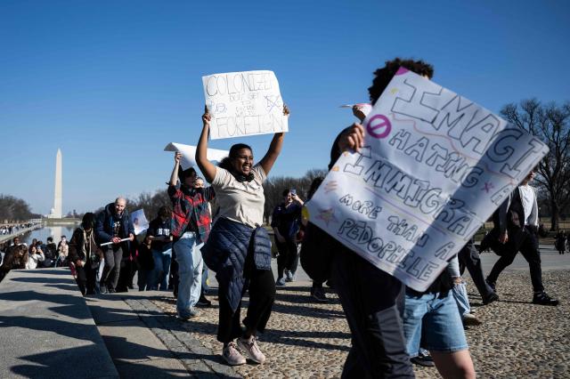 Washington DC high school students rally at an "End ICE brutality" protest by the Lincoln Memorial in Washington, DC, on February 27, 2026. (Photo by ANDREW CABALLERO-REYNOLDS / AFP)
