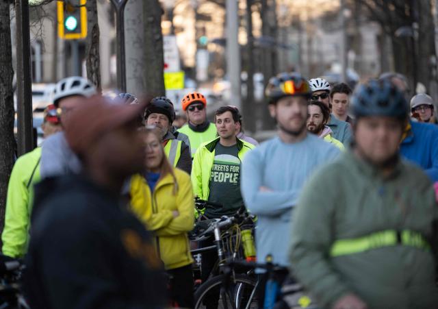 Cyclists rally for bicycle safety in Washington, DC, on February 27, 2026. The Washington Area Bicyclist Association organized a demonstration after federal agencies considered removing a section of the 15th Street protected bike lane near the National Mall. (Photo by ANDREW CABALLERO-REYNOLDS / AFP)