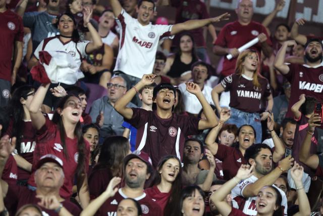 Lanus fans attend the team's celebrations, a day after defeating Flamengo at Maracana stadium in Rio de Janeiro to win the Recopa Sudamericana, at Ciudad de Lanus stadium in Lanus, Buenos Aires province on February 27, 2026. (Photo by Francisco Loureiro / AFP)
