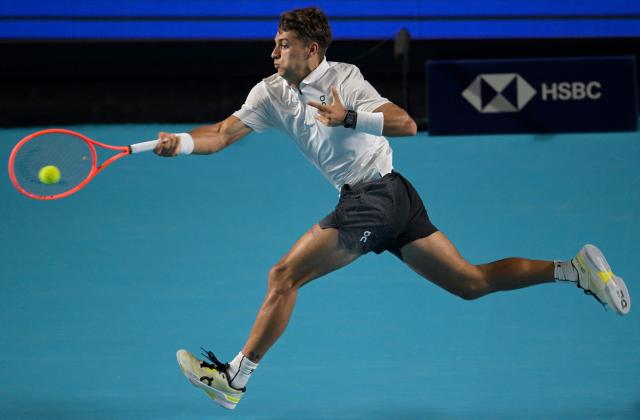 Italy's Flavio Cobolli returns to Serbian Miomir Kecmanovic during the 2026 Mexico ATP 500 Tennis Open men's singles tennis semi-final match at the Arena GNP Seguros in Acapulco, Guerrero State, Mexico on February 27, 2026. (Photo by Alfredo ESTRELLA / AFP)