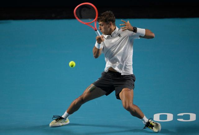 Italy's Flavio Cobolli returns to Serbian Miomir Kecmanovic during the 2026 Mexico ATP 500 Tennis Open men's singles tennis semi-final match at the Arena GNP Seguros in Acapulco, Guerrero State, Mexico on February 27, 2026. (Photo by Alfredo ESTRELLA / AFP)