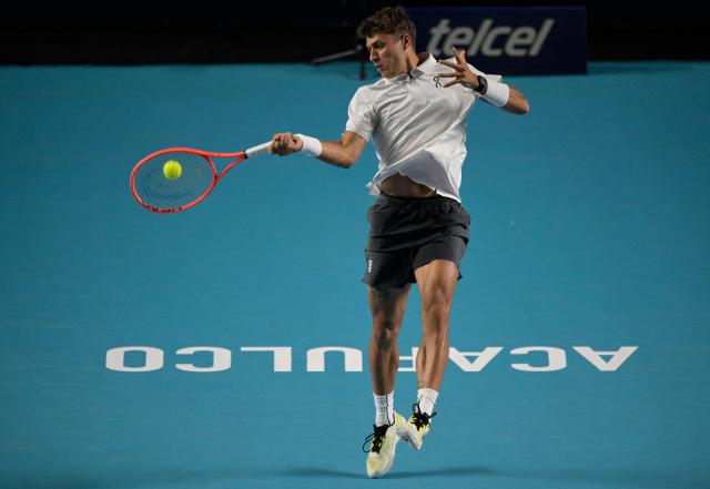Italy's Flavio Cobolli returns to Serbian Miomir Kecmanovic during the 2026 Mexico ATP 500 Tennis Open men's singles tennis semi-final match at the Arena GNP Seguros in Acapulco, Guerrero State, Mexico on February 27, 2026. (Photo by Alfredo ESTRELLA / AFP)