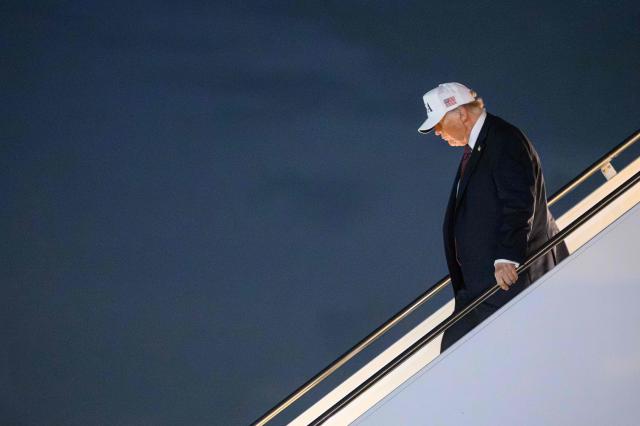 US President Donald Trump steps off Air Force One at Palm Beach International Airport in West Palm Beach, Florida, on February 27, 2026. Trump is spending the weekend at his Mar-a-Lago resort. (Photo by Mandel NGAN / AFP)