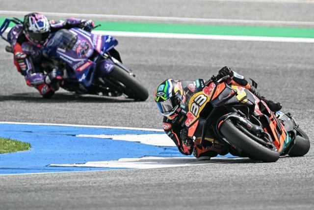 Red Bull KTM Factory Racing's South African rider Brad Binder (R) rides in front of Prima Pramac Yamaha's Austrialian rider Jack Miller during the free practice 2 session of the MotoGP Thailand Grand Prix at the Buriram International Circuit in Buriram on February 28, 2026. (Photo by Lillian SUWANRUMPHA / AFP)