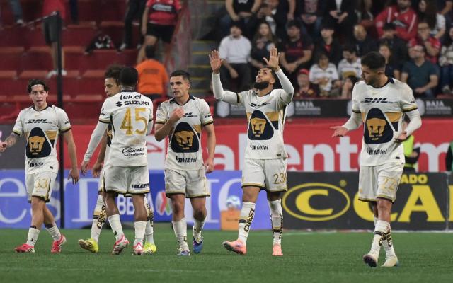 Pumas' Brazilian forward #23 Juninho Vieira celebrates after scoring the equalising goal during the Liga MX Clausura football match between Tijuana and Pumas at Caliente stadium in Tijuana, Mexico on February 27, 2026. (Photo by Guillermo Arias / AFP)