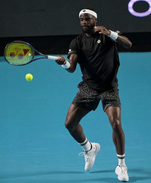 US' Frances Tiafoe returns to compatriot Brandon Nakashima during the 2026 Mexico ATP 500 Tennis Open men's singles tennis semi-final match at the Arena GNP Seguros in Acapulco, Guerrero State, Mexico on February 27, 2026. (Photo by Alfredo ESTRELLA / AFP)