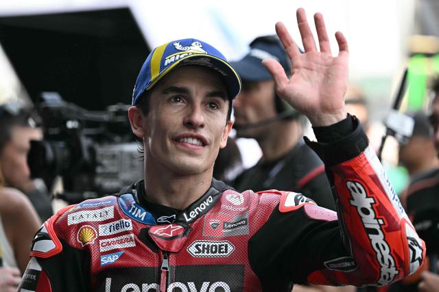 Second-placed Ducati Lenovo Team's Spanish rider Marc Marquez waves after the qualifying session of the MotoGP Thailand Grand Prix at the Buriram International Circuit in Buriram on February 28, 2026. (Photo by Lillian SUWANRUMPHA / AFP)