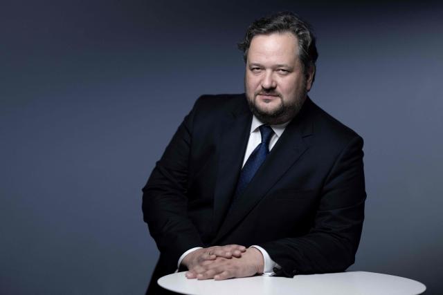 (FILES) Chief executive of Societe Generale Slawomir Krupa, poses during a photo session in Paris on May 12, 2023. Societe Generale’s board of directors is according to reports on February 27, 2026, proposing a 45% increase in the fixed compensation of its Chief Executive Officer, Slawomir Krupa, to around 2.4 million euros per year starting in 2026, due to the group’s “exceptional performance” since he took over. (Photo by JOEL SAGET / AFP)