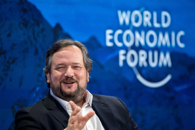 (FILES) Societe Generale CEO Slawomir Krupa gestures as he attends a session at the World Economic Forum (WEF) meeting in Davos on January 17, 2024. Societe Generale’s board of directors is according to reports on February 27, 2026, proposing a 45% increase in the fixed compensation of its Chief Executive Officer, Slawomir Krupa, to around 2.4 million euros per year starting in 2026, due to the group’s “exceptional performance” since he took over. (Photo by Fabrice COFFRINI / AFP)