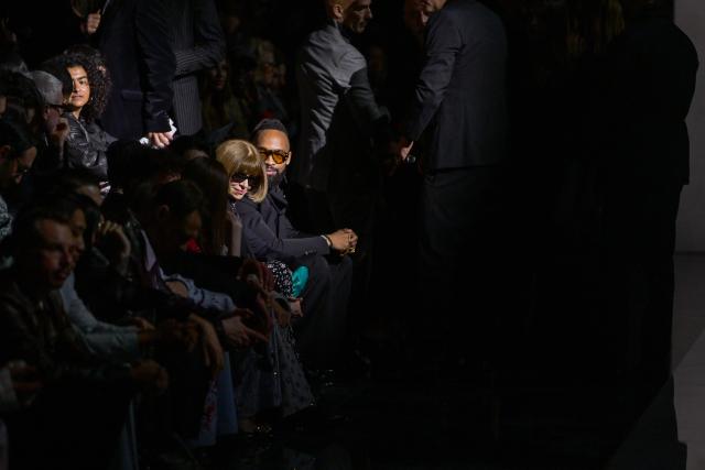 US singer Madonna's boyfriend Akeem Morris (R) sits by British journalist Anna Wintour before the start of the womens's ready-to-wear Fall/Winter 2026 collection fashion show as part of the Milan Fashion Week, in Milan on February 28, 2026. (Photo by Miguel MEDINA / AFP)