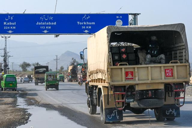 Pakistani army trucks carrying ammunition arrive near the Torkham border between Afghanistan and Pakistan on February 28, 2026, amidst the ongoing clashes between the two countries. Afghanistan said it downed a Pakistan fighter jet and captured its pilot on February 28, a claim denied by Islamabad a day after it declared an "open war" with its South Asian neighbour. (Photo by Abdul MAJEED / AFP)
