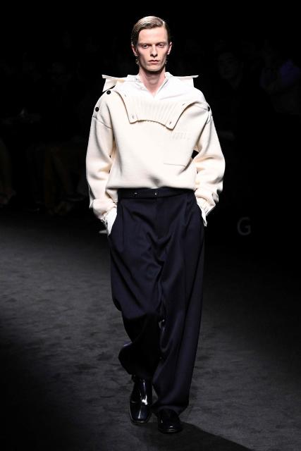 A model presents a creation for Ferragamo for the Women's Ready to Wear Fall/Winter 2026-2027 collection fashion show as part of the Milano Fashion Week, in Milan, northern Italy, on February 28, 2025. (Photo by Andreas SOLARO / AFP)