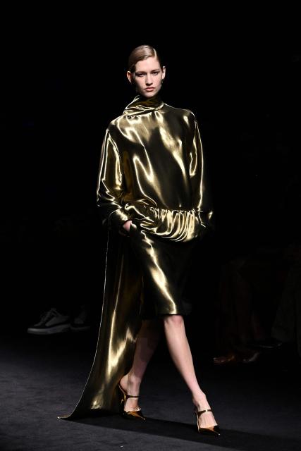 A model presents a creation for Ferragamo for the Women's Ready to Wear Fall/Winter 2026-2027 collection fashion show as part of the Milano Fashion Week, in Milan, northern Italy, on February 28, 2026. (Photo by Andreas SOLARO / AFP)