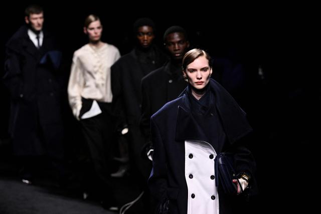 Models present creations for Ferragamo at the end of the Women's Ready to Wear Fall/Winter 2026-2027 collection fashion show as part of the Milano Fashion Week, in Milan, northern Italy, on February 28, 2026. (Photo by Andreas SOLARO / AFP)