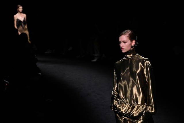 A model presents a creation for Ferragamo for the Women's Ready to Wear Fall/Winter 2026-2027 collection fashion show as part of the Milano Fashion Week, in Milan, northern Italy, on February 28, 2026. (Photo by Andreas SOLARO / AFP)