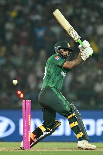 Pakistan's Fakhar Zaman is clean bowled during the 2026 ICC Men's T20 Cricket World Cup Super Eights match between Sri Lanka and Pakistan at Pallekele International Cricket Stadium in Kandy on February 28, 2026. (Photo by R. Satish BABU / AFP)