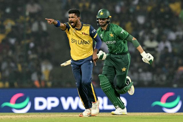 Sri Lanka's Dilshan Madushanka (L) celebrates after taking the wicket of Pakistan's Shaheen Shah Afridi during the 2026 ICC Men's T20 Cricket World Cup Super Eights match between Sri Lanka and Pakistan at the Pallekele International Cricket Stadium in Kandy on February 28, 2026. (Photo by Ishara S. KODIKARA / AFP)