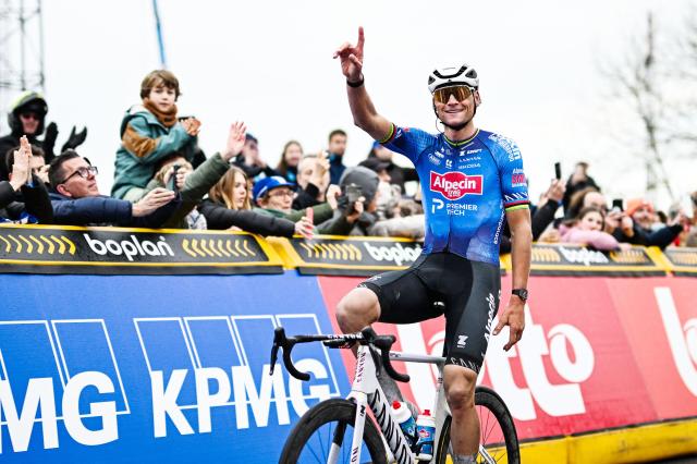 Netherlands' Mathieu van der Poel of Alpecin-Premier Tech celebrates as he wins the 81st edition of the men's one-day cycling race Omloop Het Nieuwsblad (UCI World Tour), the opening race of the Flemish one-day classics season, 207,6 km from Gent to Ninove on February 28, 2026. (Photo by MAARTEN STRAETEMANS / Belga / AFP) / Belgium OUT