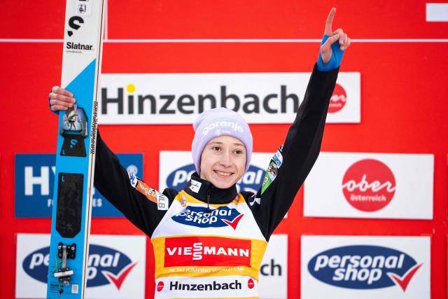 Slovenia's Nika Prevc celebrates on the podium after Women's Normal Hill HS90 competition at the FIS Ski Jumping World Cup in Hinzenbach, Austria, on February 28, 2026. Slovenia's Nika Prevc won the event ahead on Austria's Lisa Eder (2nd) and Norway's Anna Odine Stroem (3rd). (Photo by GEORG HOCHMUTH / APA / AFP) / Austria OUT
