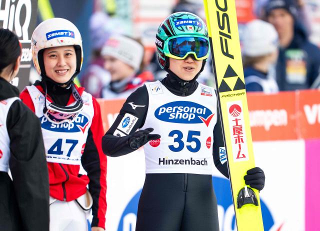Japan's Nozomi Maruyama and Yuki Ito (R) are pictured during the Women's Normal Hill HS90 competition at the FIS Ski Jumping World Cup in Hinzenbach, Austria, on February 28, 2026. (Photo by GEORG HOCHMUTH / APA / AFP) / Austria OUT