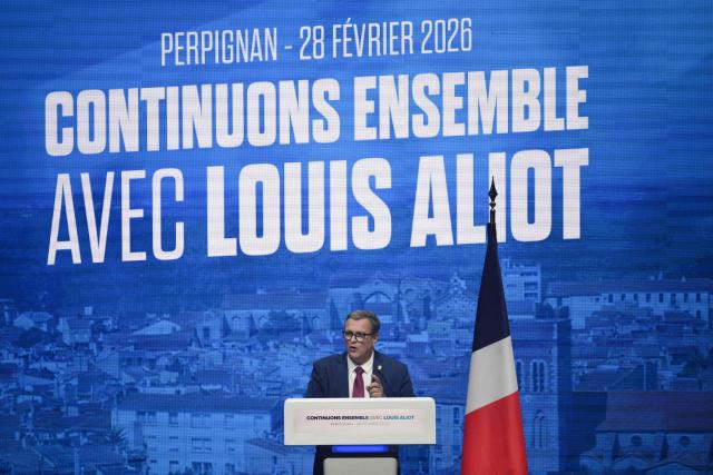 French far-right Rassemblement National (RN) party candidate for his reelection in Perpignan Louis Aliot speaks during a rally ahead of France's municipal elections, in Perpignan, southern France on February 28, 2026. French voters head to the polls for municipal elections on March 15 and 22, 2026. (Photo by Ed JONES / AFP)
