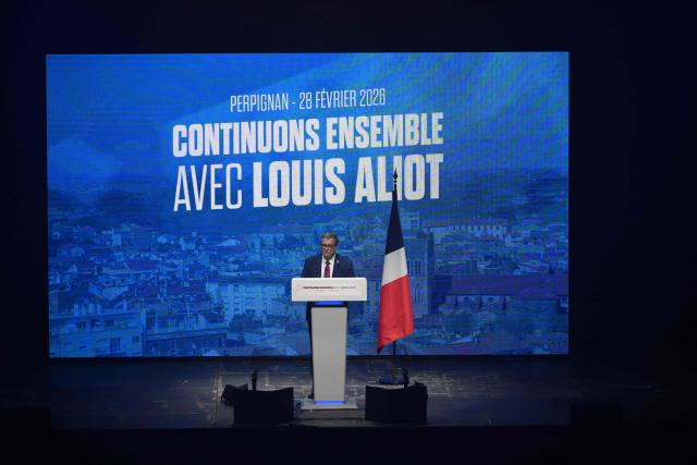 French far-right Rassemblement National (RN) party candidate for his reelection in Perpignan Louis Aliot speaks during a rally ahead of France's municipal elections, in Perpignan, southern France on February 28, 2026. French voters head to the polls for municipal elections on March 15 and 22, 2026. (Photo by Ed JONES / AFP)