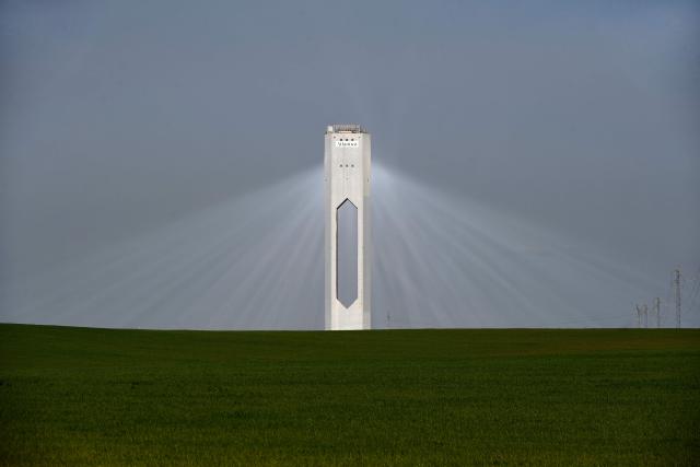TOPSHOT - A picture taken on February 27, 2026 shows a solar power tower at Atlantica Yield solar plant in Sanlucar La Mayor. (Photo by Cristina Quicler / AFP)
