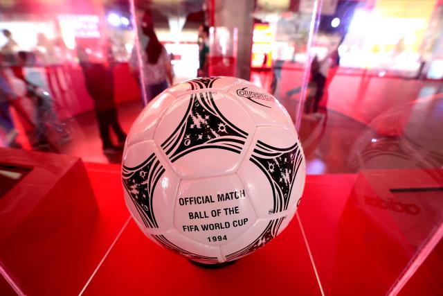 An exhibition of official FIFA World Cup balls is pictured as part of the pre-World Cup experience at the Akron Stadium, where the FIFA World Cup trophy arrived as the second part of its tour in Zapopan, Mexico on February 28, 2026. (Photo by ULISES RUIZ / AFP)