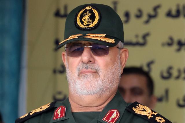 (FILES) Commander of the ground forces of Iran's Islamic Revolutionary Guard Corps, Brigadier General Mohammad Pakpour, attends a military parade as part of a ceremony marking the country's annual army day in Tehran, on April 17, 2024. The Israeli military said it had killed seven senior Iranian officials, including the head of Iran's Revolutionary Guards, General Mohammad Pakpour, in a wave of US-Israel strikes on Iran on February 28, 2026. (Photo by ATTA KENARE / AFP)