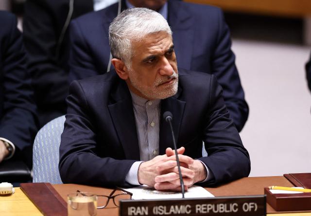 Iranian Ambassador to the UN Amir-Saeid Iravani speaks during a United Nations Security Council meeting on the situation in the Middle East at the UN headquarters in New York on February 28, 2026. United Nations chief Antonio Guterres condemned "escalation" in the Middle East after US and Israeli strikes on Iran, on which the UN Security Council will hold an emergency meeting Saturday. (Photo by CHARLY TRIBALLEAU / AFP)