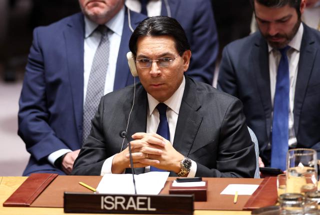 Permanent Representative of Israel to the UN Danny Danon speaks during a United Nations Security Council meeting on the situation in the Middle East at the UN headquarters in New York on February 28, 2026. United Nations chief Antonio Guterres condemned "escalation" in the Middle East after US and Israeli strikes on Iran, on which the UN Security Council will hold an emergency meeting Saturday. (Photo by CHARLY TRIBALLEAU / AFP)