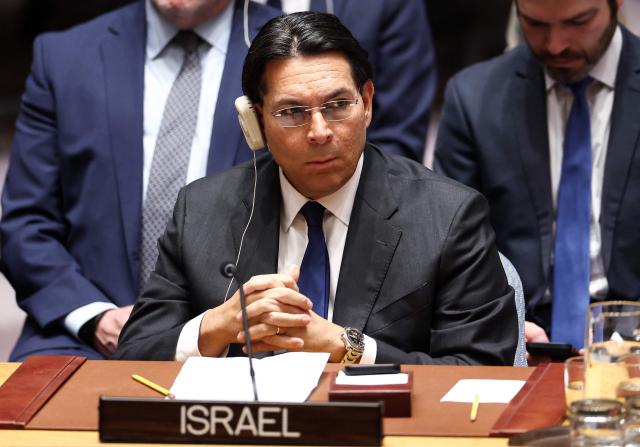 Permanent Representative of Israel to the UN Danny Danon speaks during a United Nations Security Council meeting on the situation in the Middle East at the UN headquarters in New York on February 28, 2026. United Nations chief Antonio Guterres condemned "escalation" in the Middle East after US and Israeli strikes on Iran, on which the UN Security Council will hold an emergency meeting Saturday. (Photo by CHARLY TRIBALLEAU / AFP)