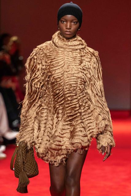A model presents a creation for Bottega Veneta during the womens's ready-to-wear Fall/Winter 2026 collection fashion show as part of the Milan Fashion Week, in Milan on February 28, 2026. (Photo by MIGUEL MEDINA / AFP)