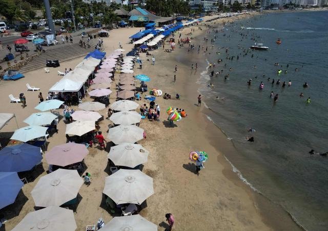 Aerial view of the Acapulco beach, Guerrero state, Mexico on February 28, 2026. (Photo by Alfredo ESTRELLA / AFP)